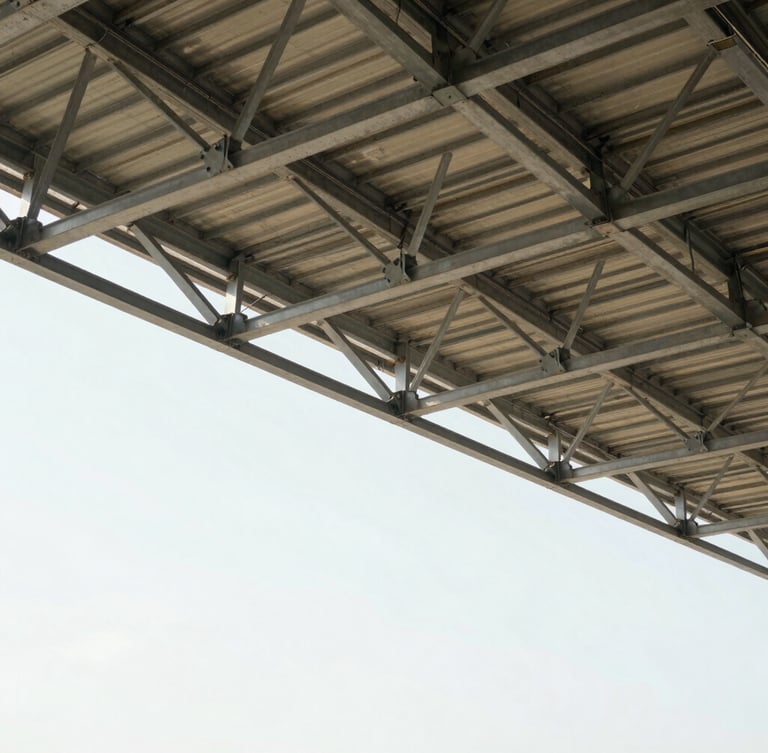 Wide panoramic 21:9 frame of a commercial building's exposed steel roof trusses, bright natural lighting, sharp architectural lines, expansive negative space on the left.