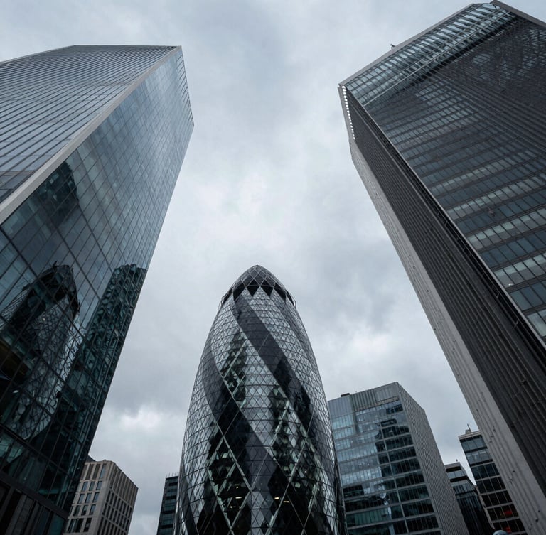 Dramatic low-angle architectural perspective of London financial district skyscrapers under diffused overcast daylight, sharp structural lines cutting into a soft sky.