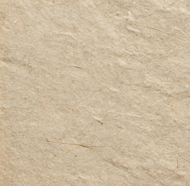 Extreme macro shot of 18th-century deckled paper grain under raking side-light, showcasing fiber texture and a faint watermark