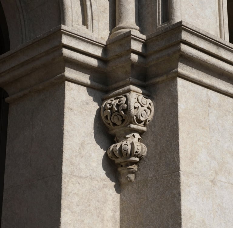 Close-up of carved stone architectural details on a historic trust building, long dramatic shadows, soft natural light.