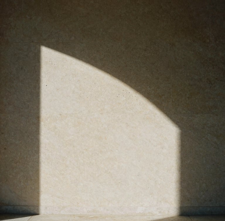 Low-angle sunlight hitting a raw Lioz limestone wall, deep shadows, textured 35mm film grain, minimalist Portuguese interior