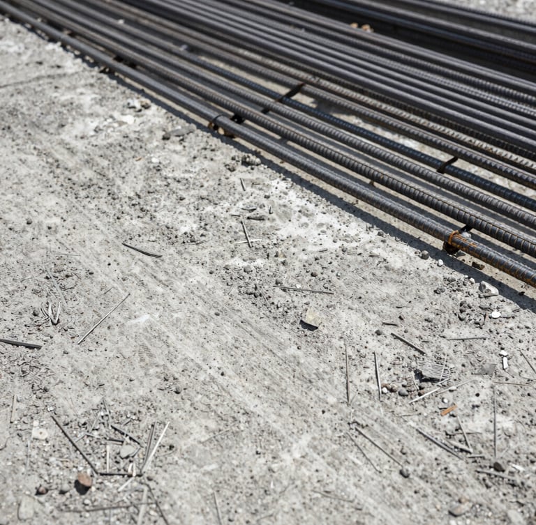 Close-up of raw textured concrete and perfectly aligned steel reinforcement bars, harsh natural daylight, high contrast, gritty documentary style, 35mm