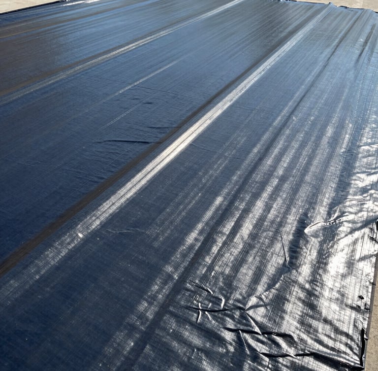 Macro shot of high-grade industrial waterproofing membranes and protective coatings, bright natural daylight highlighting material texture, 35mm