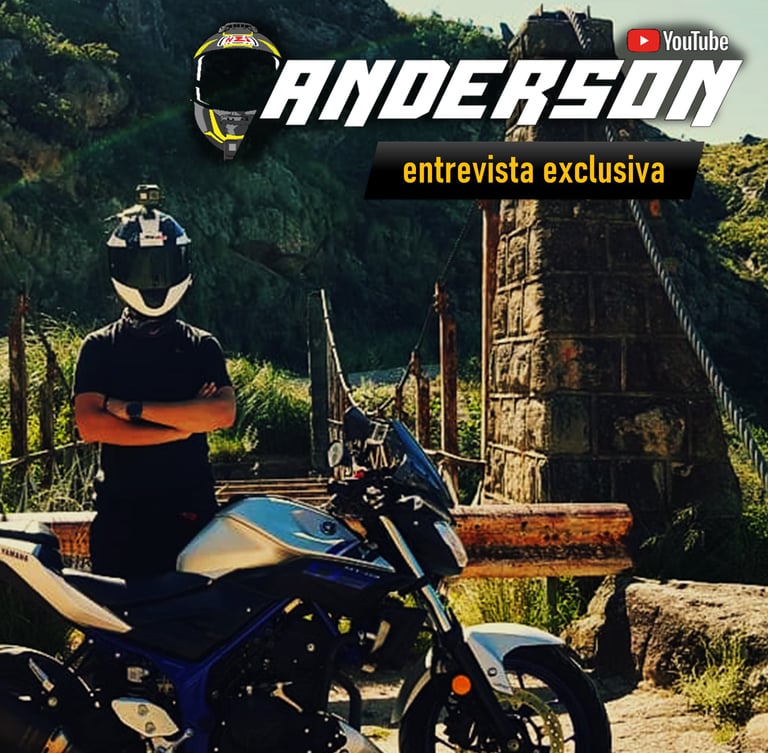 a man in a helmet and a helmet on a motorcycle
