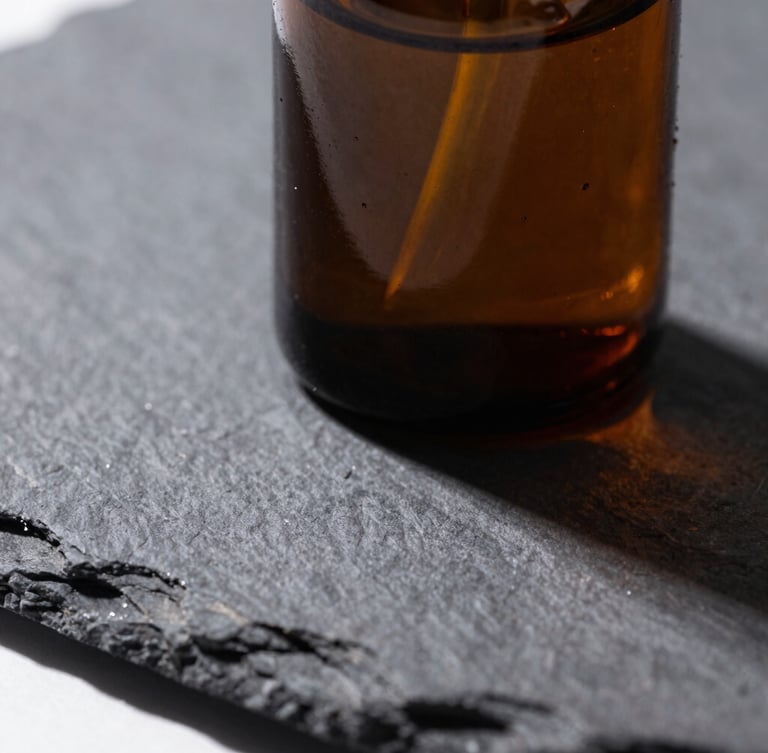 Macro close-up of a dark amber glass apothecary jar on a dark slate surface, crisp laboratory-style overhead light with sharp shadows, high contrast, sharp editorial product photography