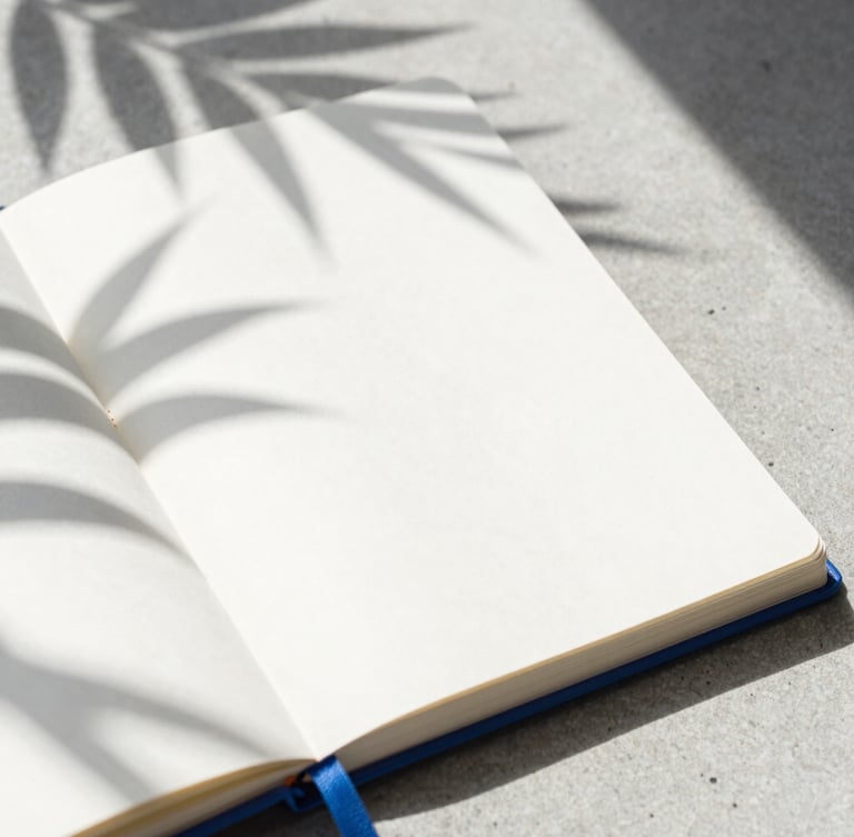 Extreme close-up of a high-end physical planning notebook on a concrete desk, sharp tropical shadows from window blinds, bright high-key lighting