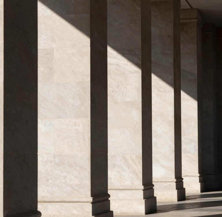 Direct sunlight casting sharp geometric shadows across monolithic travertine columns, architectural elevation, high contrast, clean minimalist lines