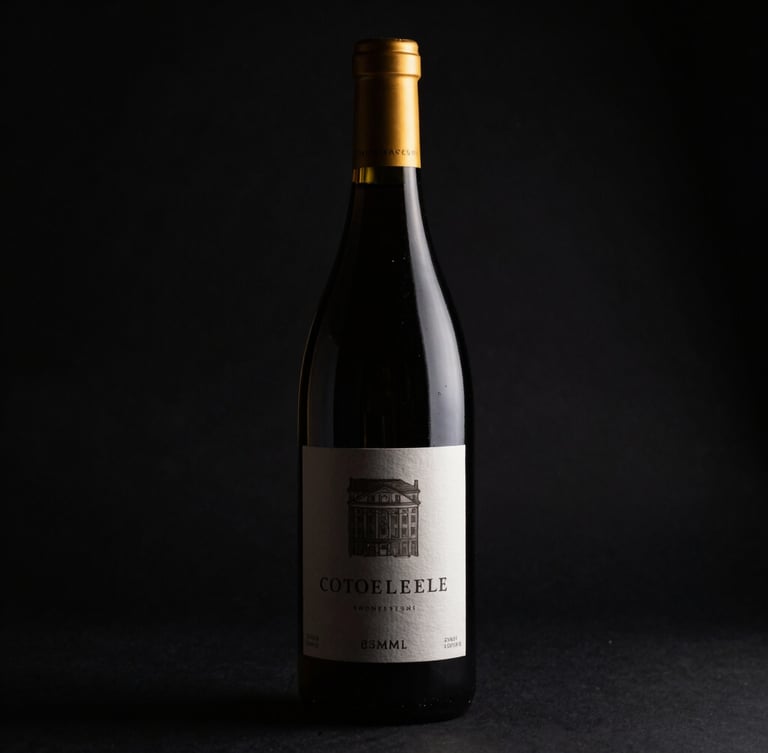 Dramatic low-key product photography of a single premium wine bottle cast in deep shadow, sharp gold rim lighting, rich black background, 85mm lens