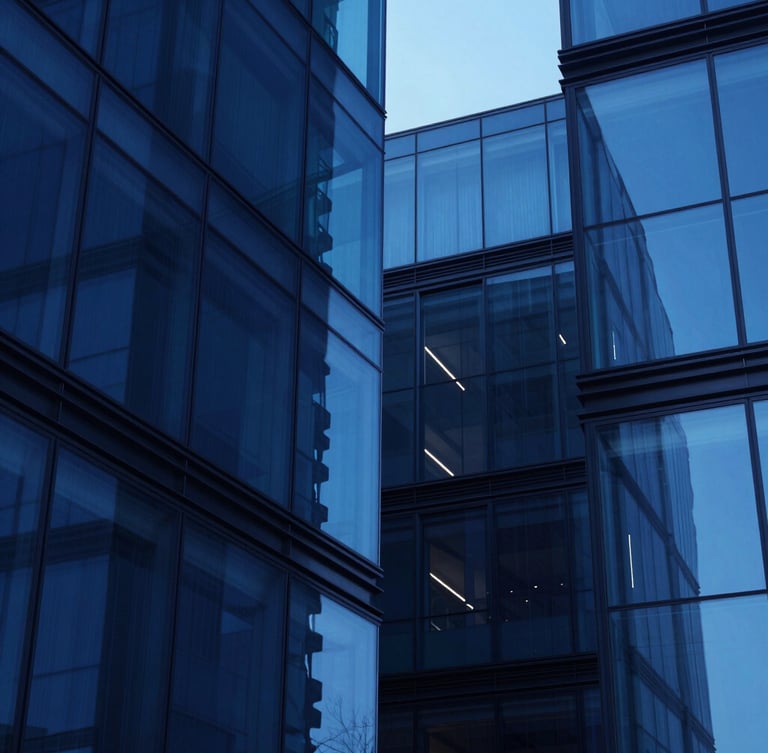 Sleek corporate technology architecture, abstract geometric glass structures reflecting cool blue light, high contrast studio lighting, minimalist composition