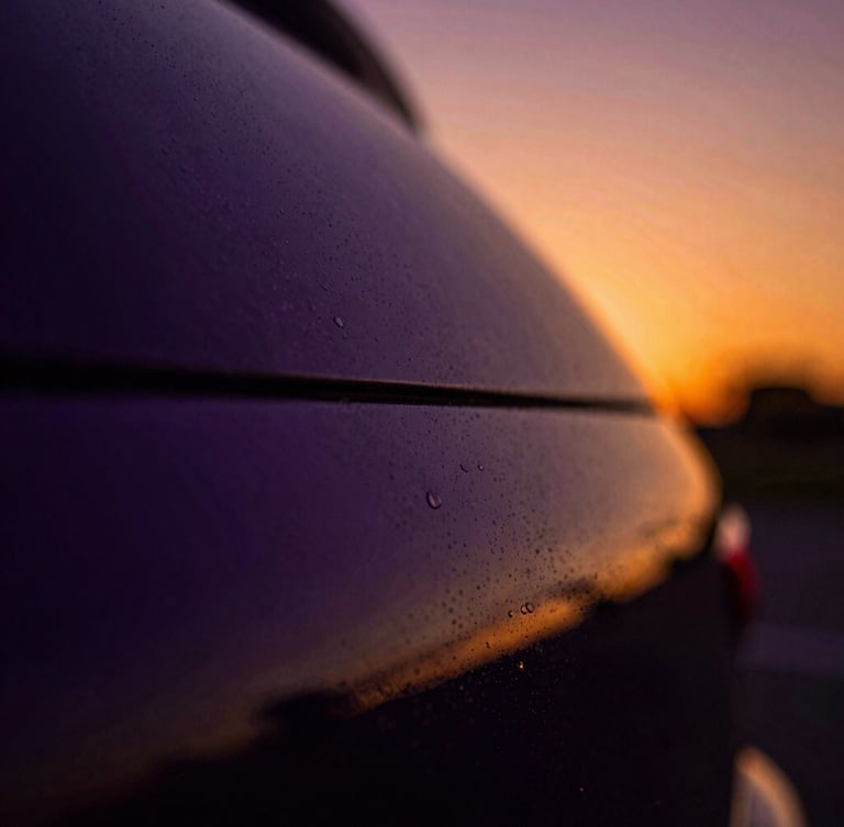 Macro close-up of vibrant digital artwork showing deep purple and gold gradient textures, dramatic low-key lighting, sharp focus
