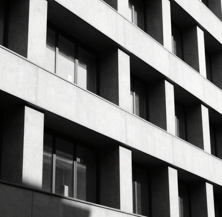 High-contrast black and white architectural detail of a modern corporate building facade in Milan, sharp geometric shadows, minimalist aesthetic, 35mm lens.