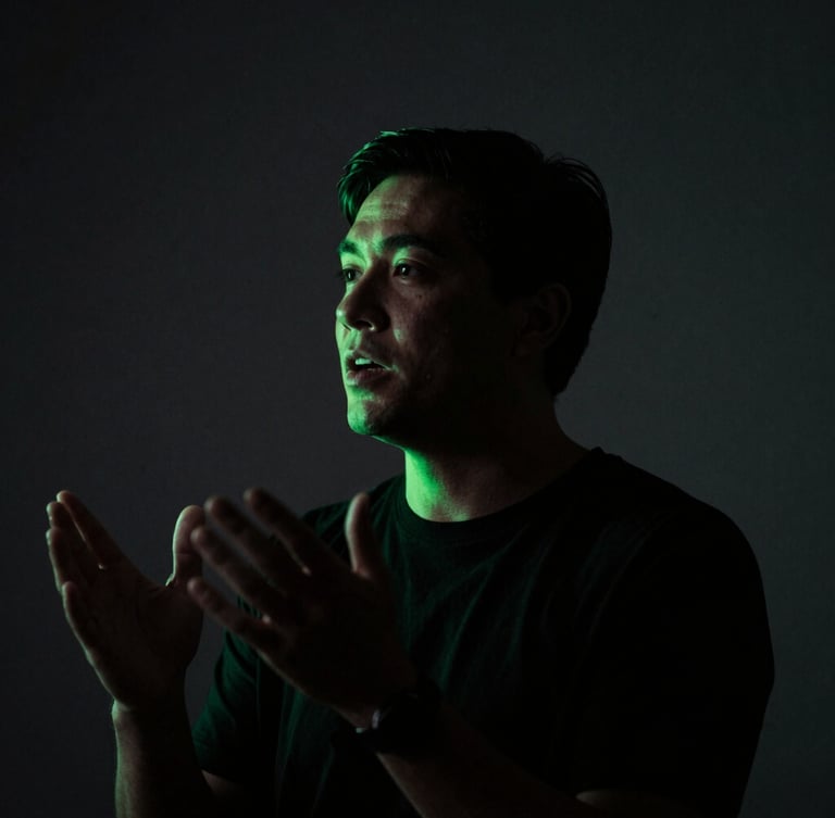 Expressive portrait of a speaker in mid-speech, dramatic low-key studio lighting, dark charcoal background, sharp neon green accent light on the silhouette, shallow depth of field, 35mm
