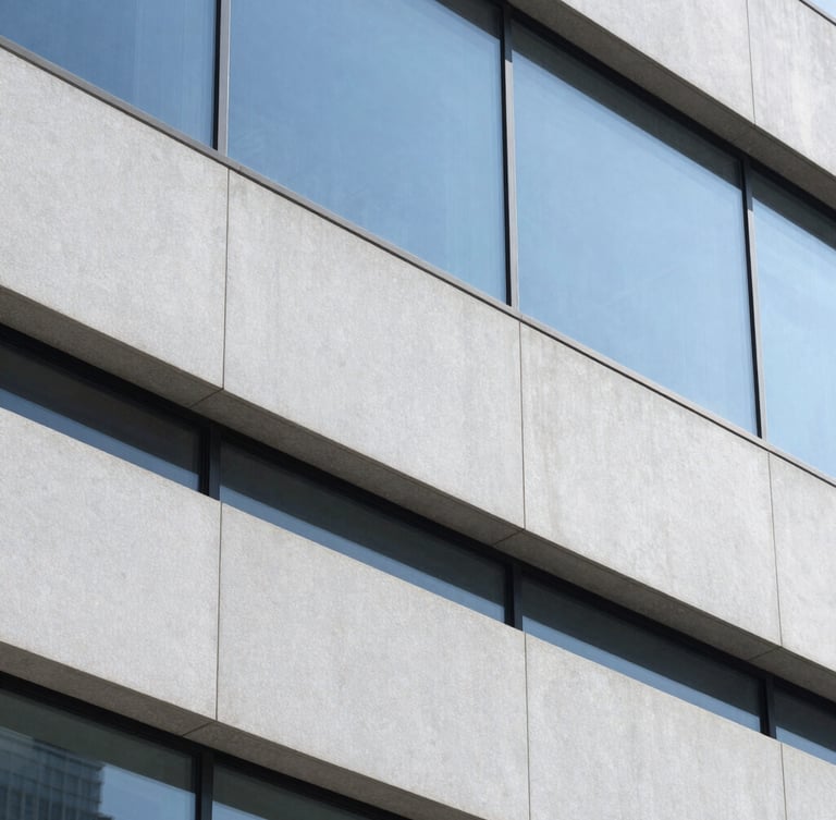 Close-up of a clean architectural surface in a modern corporate office, bright natural daylight, sharp focus
