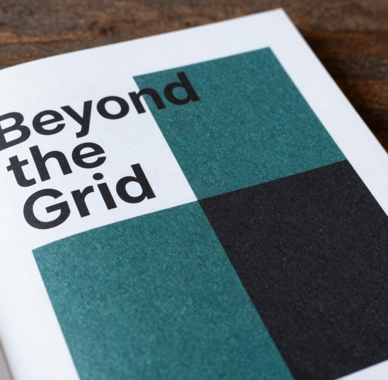 Editorial book photography of the 'Beyond the Grid' cover, bold minimalist geometric design, deep teal and rich black tones, soft side-lighting, 3:4 portrait crop
