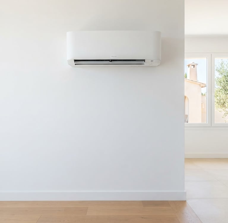 Pristine white wall with a newly installed, sleek, modern air conditioning unit, clean lines, bright Mediterranean daylight, sharp focus, 35mm