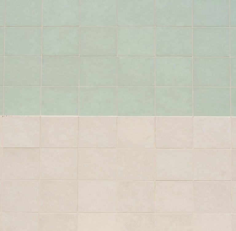 editorial architectural photography of tile substrate preparation with a green uncoupling membrane, clean lines, bright daylight, 35mm