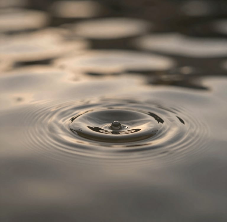 Ethereal fine-art photography of soft-focus water ripples under low-contrast, warm pearlescent backlit ambient light, shallow depth of field, 35mm