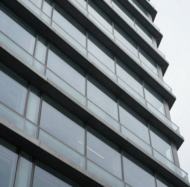 Macro close-up of a structured architectural facade with clean steel and glass lines under cool overcast daylight, sharp focus on geometric patterns
