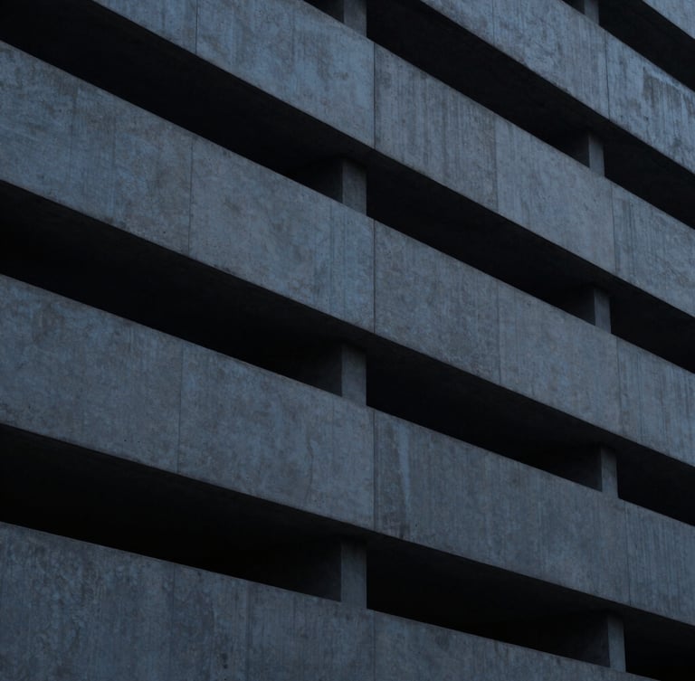 Minimalist close-up of architectural lines, concrete and steel structure, cool diffused daylight, high contrast, 35mm.