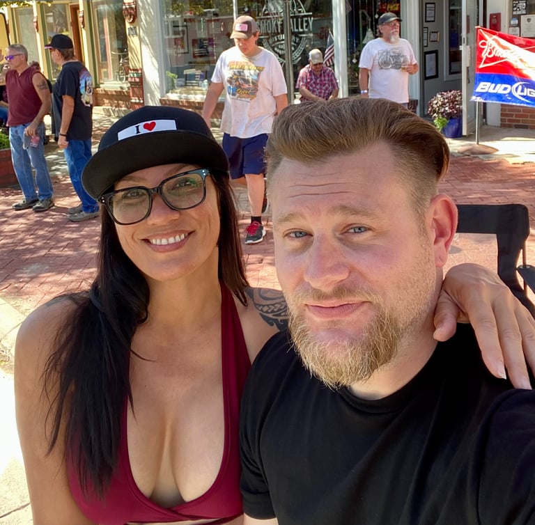 Man and woman posing for a picture