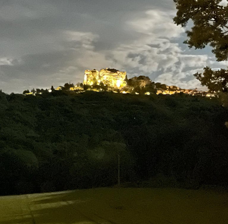 Saignon Rock illuminated at night