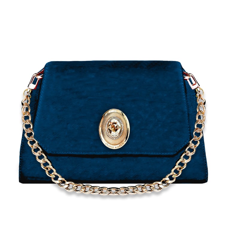 Luxury navy blue velvet clutch bag with gold chain strap and ornate metallic clasp.
