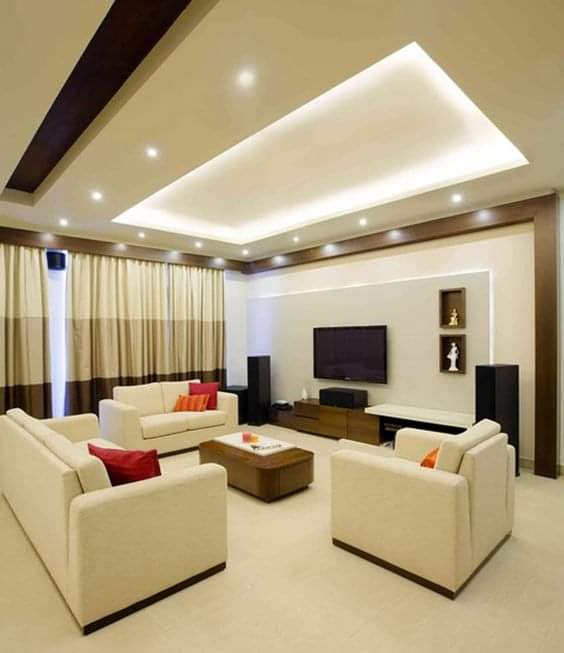 a living room with a couch Celling Curtain Sofa set center table and a television