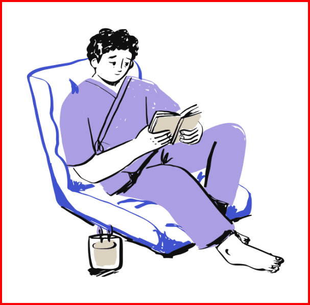 A man in a purple outfit sitting and reading looking rather sad