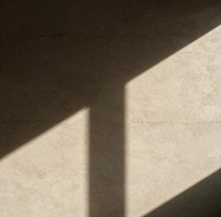 Dramatic high-contrast study of architectural shadows and light on a warm alabaster concrete wall, minimalist composition, medium format film style.