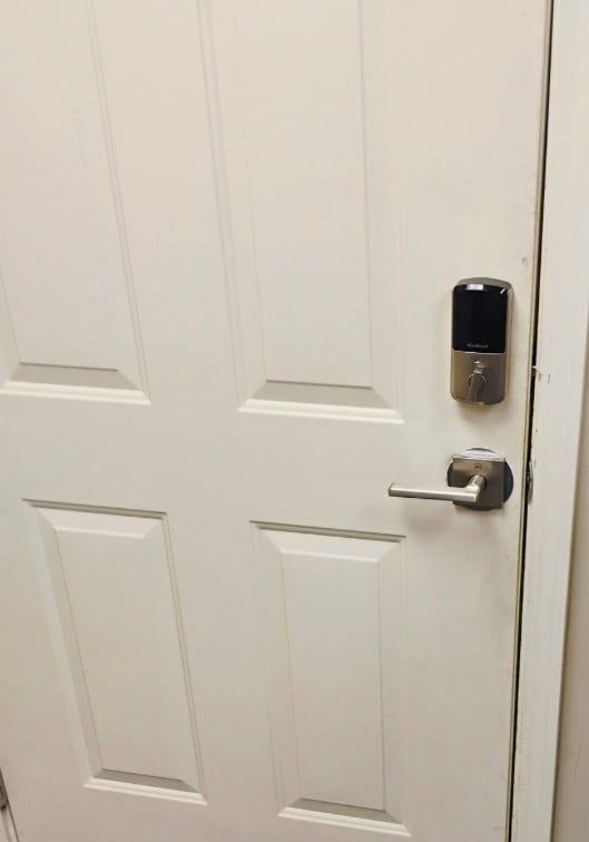 Commercial white door with access control security lock