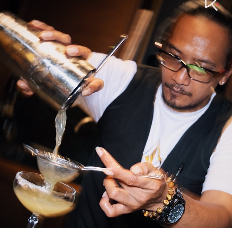 Kenji Ramen Bali vibrant evening atmosphere - izakaya dining with music and entertainment