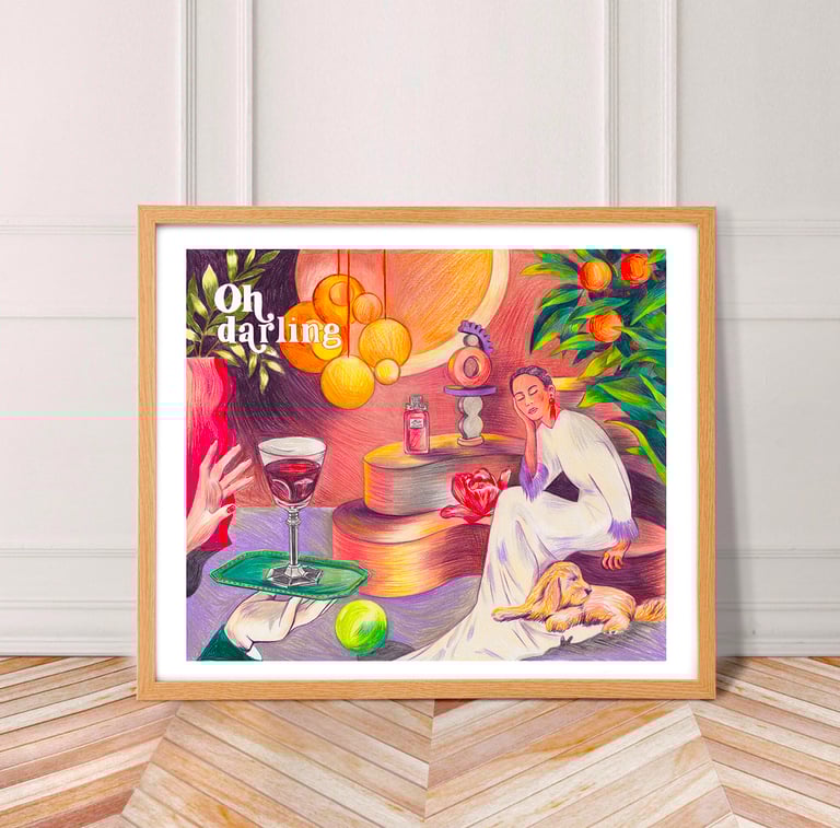 a framed print of a woman drinking a glass of wine