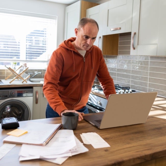 Builder reviewing project costs