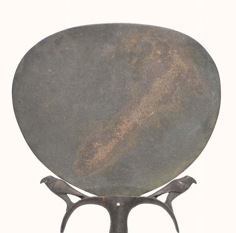 Egyptian mirror with falcons on handle