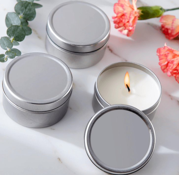 a scented candle in a tin