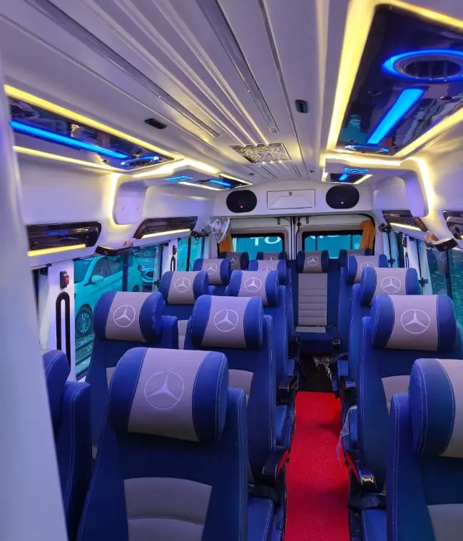 16 seater luxury tempo traveller interior on rent in Delhi ideal for family and group travel