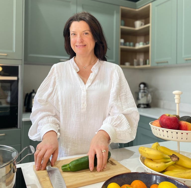 Louise Chamberlain in her kitchen. Nutrition coach, IBD support, gut health, menopause coach