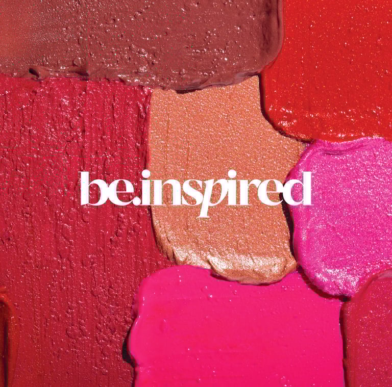 a close up of a lipstick - covered lip and lip glosses