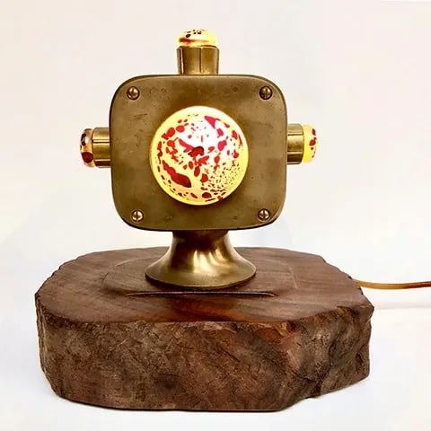 Custom light made from brass boat guidance body and blown glass.