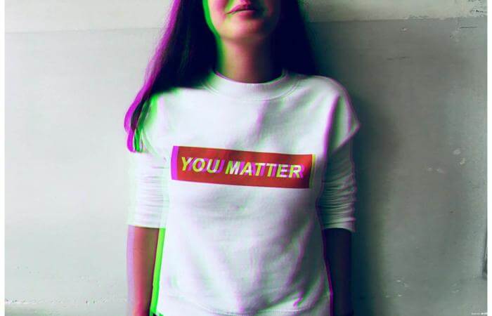 Person wearing a shirt that reads ‘You Matter,’ representing dignity, value, and encouragement.