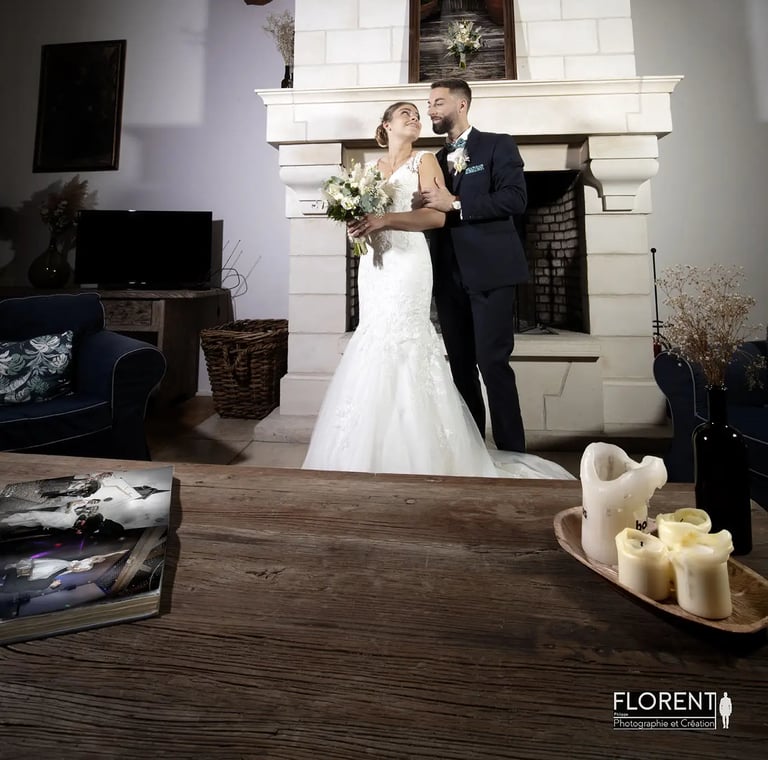 weeding photographer florent lille saint omer bride and groom standing in a room with candles