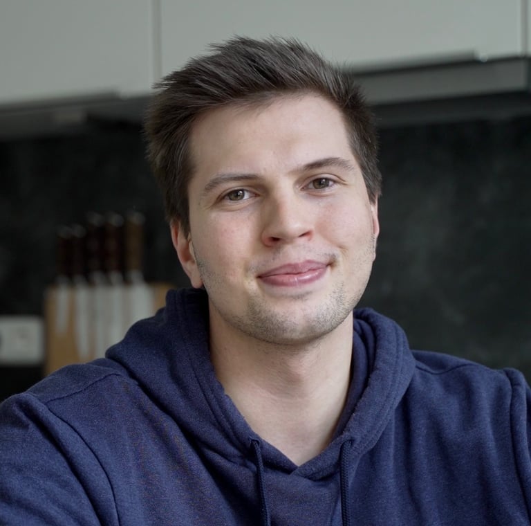 a man in a blue hoodie and a blue hoodie