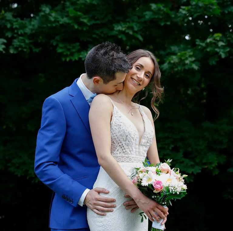 florent photographe mariage lille saint omer couple a bride and groom standing in front of a tree