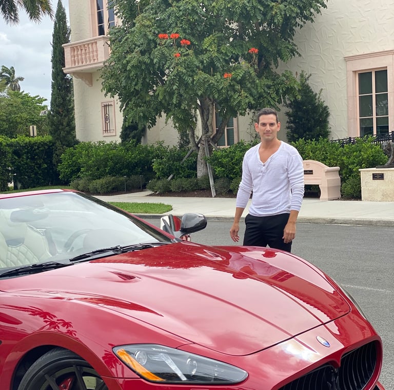 A red Maserati and Rick Rockefeller-Silvia, Palm Beach, Florida USA