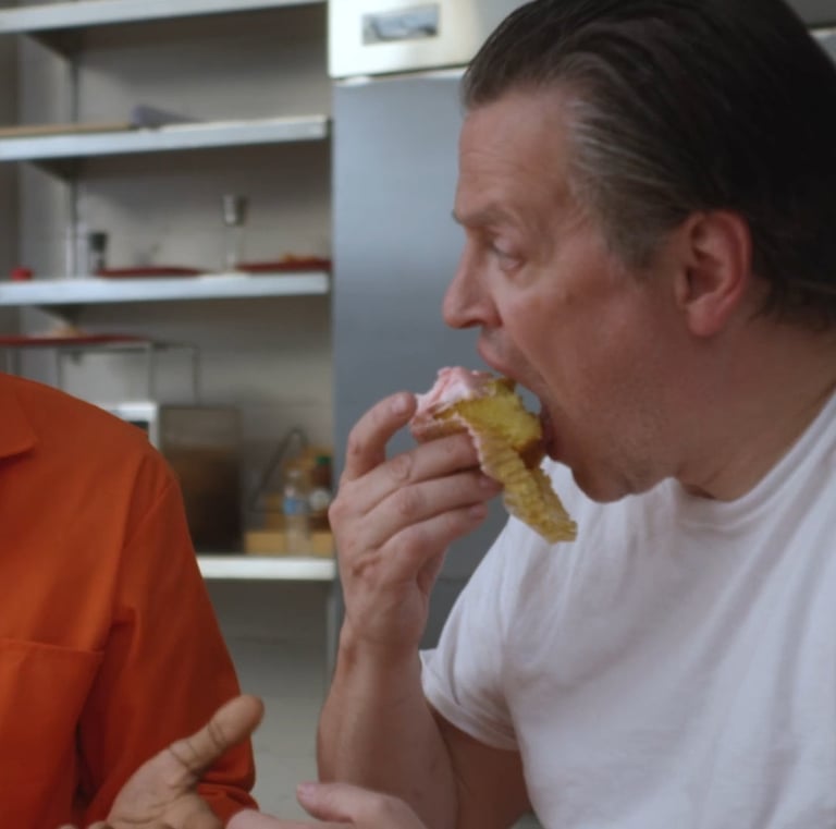 Ethan Eating an Ivana Cake talking to Marcus - Prisoner Trump Imagein Cafeteria