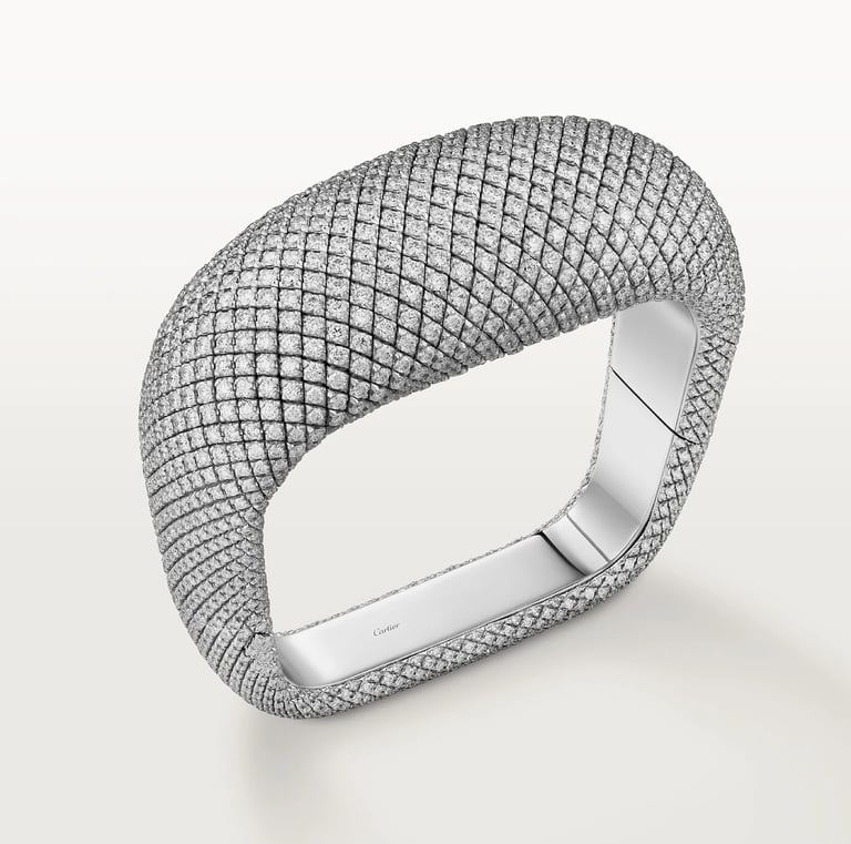 Cartier diamond-encrusted bracelet with a modern geometric design.