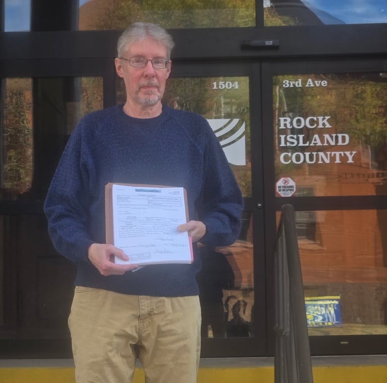 Steven Rugh at the County Office to turn in his Petition Packet.
