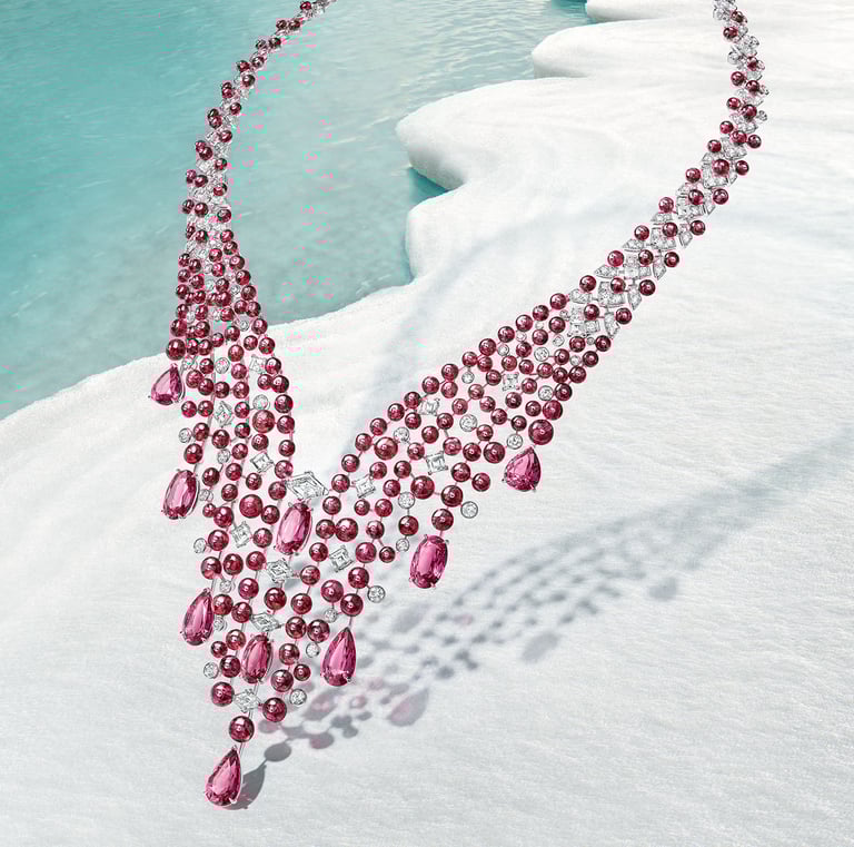 Cartier pink sapphire and diamond necklace on ice.