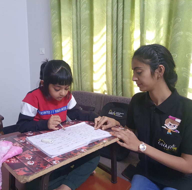 a home tutor from gharpadh sitting on a couch with a child