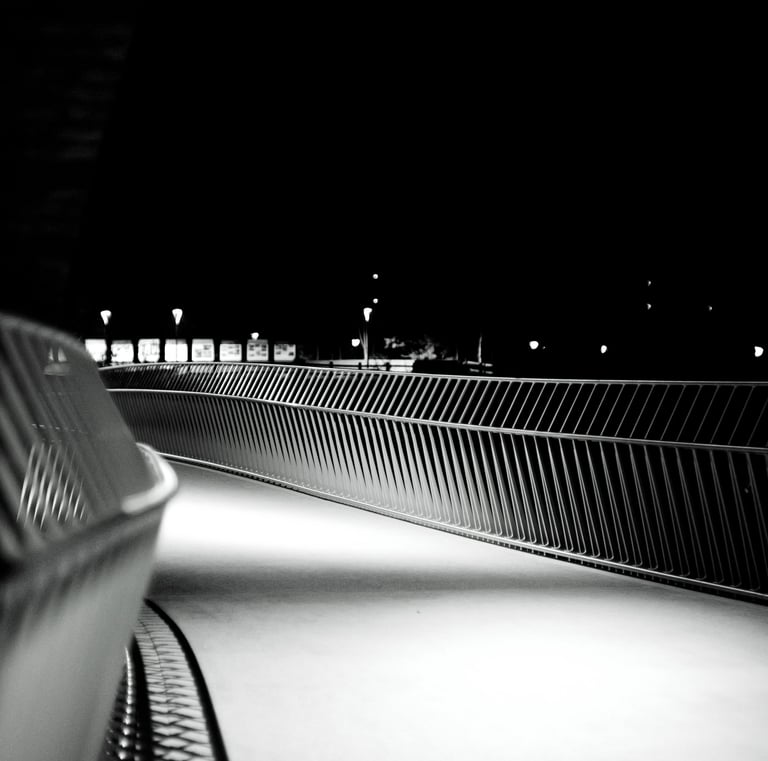 a skateboarder is riding his board down a ramp